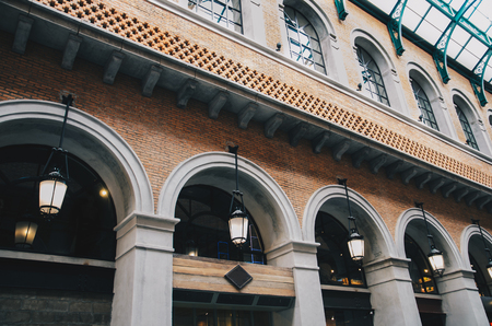 brick vintage building with lamp hangingの写真素材