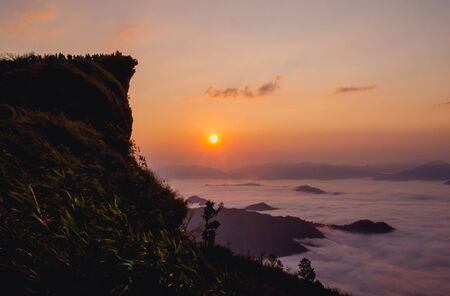 great mountain with sunrise and mistの写真素材