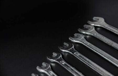sort of wrench on black backgroundの写真素材
