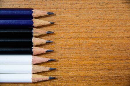 pencil on wooden table with space on top viewの写真素材