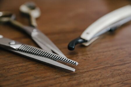 close up of barber tool on wooden tableの写真素材
