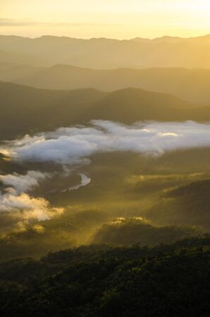 mountain view with warm sun light in verticalの写真素材
