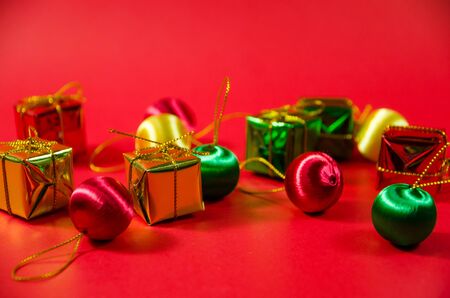 group of  ball and gift in christmas on red background on top viewの写真素材
