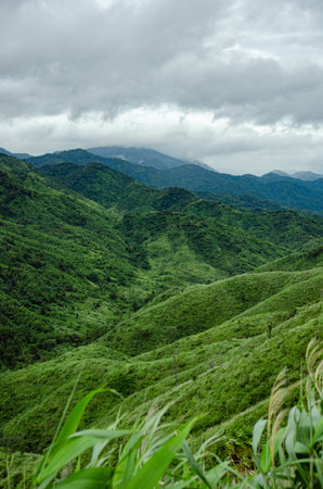 green mountain view in cloudy day