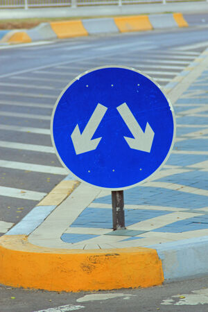 Sign showing different paths to take depicting decision makingの写真素材