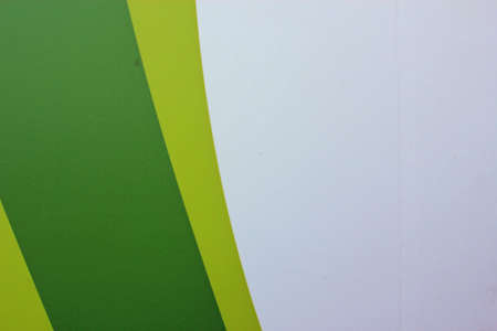 Background green swirl pattern with isolated white space for textの写真素材