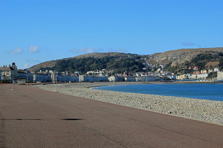 Seaside at Llandudno, Wales, UK on a beautiful clear day with blue skyの写真素材