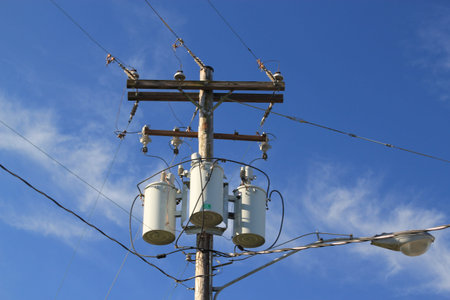 Close up of an electricity pylon with power cables