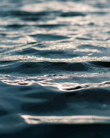 Waves and ripples on waterの写真素材