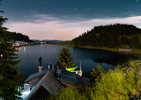 Beautiful view of the lake in the mountains at night. High quality photoの写真素材