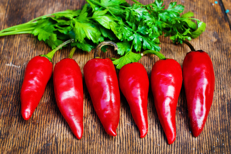 Red Hot Chili Peppers over wooden backgroundの写真素材
