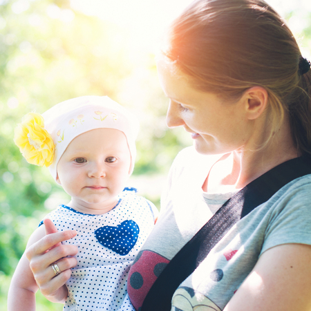 Happy Family outdoors - Summer sunshine - happy healthy child with motherの写真素材