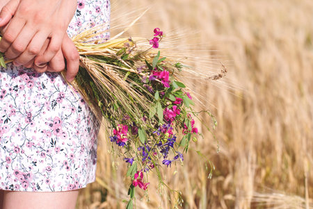 Woman with Wild Flowers in Summer - natural beautyの写真素材