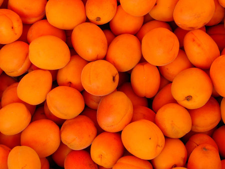 Fresh juicy apricots at local market