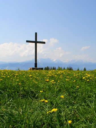 Wooden cross on top of mountainの写真素材