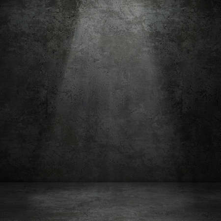 Grungy concrete wall and stone floor room with volume light as backgroundの写真素材