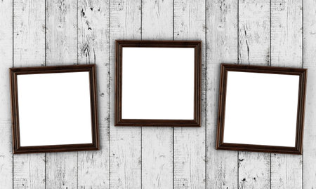 Photo frames on wooden background