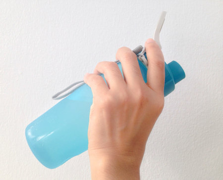Drinking water with blue bottle