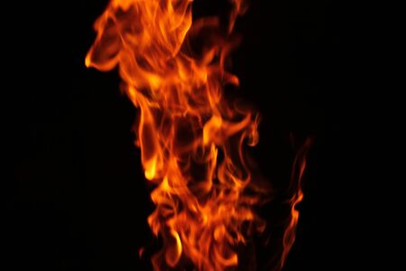 Blurred background. Fire flames pattern on black.の写真素材