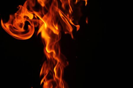 Blurred background. Fire flames pattern on black.の写真素材