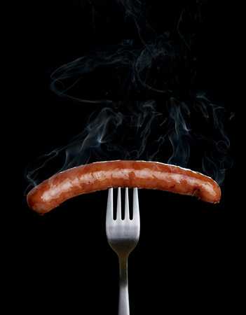 sausage on black の写真素材