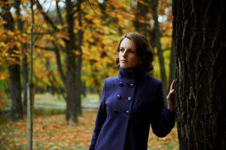 Beautiful young woman posing in parkの写真素材