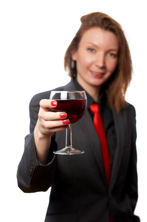 Smiling woman with wineの写真素材