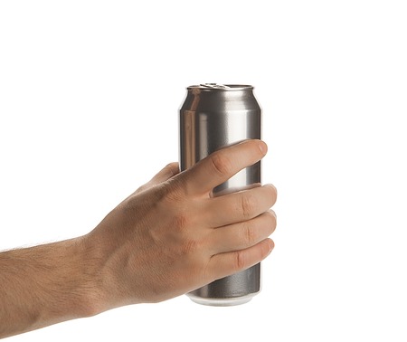 Beed can in hand isolated on a white backgroundの写真素材