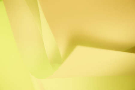 Abstract twisted sheets of folded paper. backround.の写真素材