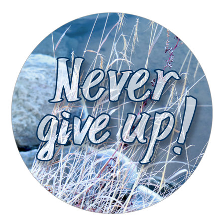 Never give up - Positive phrase on winter background. Lettering in circle Photo in white frame. Snow and waterの写真素材