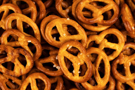 A bunch of beautiful crispy salty pretzels. Flat lay photo. Studio shot.