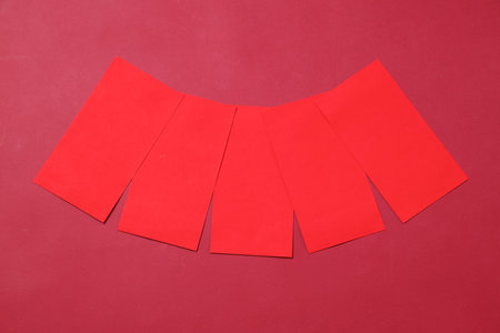 Chinese red envelopes isolated on red background.