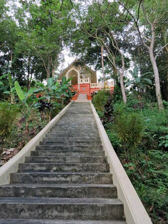 Long staircase leading to the temple of Buddhaの写真素材