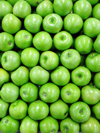 green apples at the marketplaceの写真素材