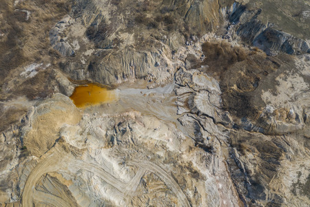 Aerial view of an open mine pit. Exploitation and nature pollutionの写真素材