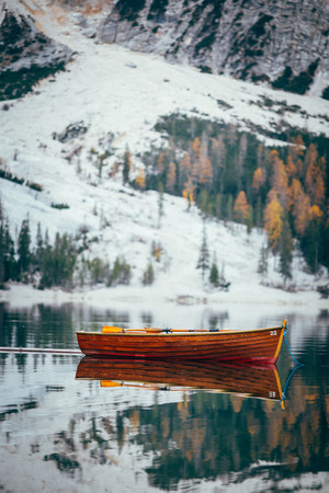 Autumn at Braies lake, Italy. Famous lake in the Dolomites.の写真素材