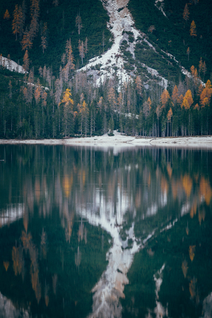 Autumn at Braies lake, Italy. Famous lake in the Dolomites.の写真素材