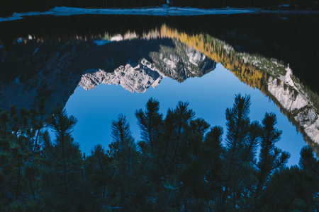 Autumn at Braies lake, Italy. Famous lake in the Dolomites.の写真素材