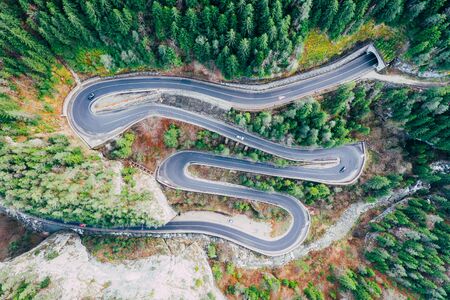 Drone view of winding forest road in the middle of Bicaz Gorge, Transylvaniaの写真素材