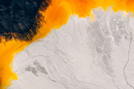 Drone view of contaminated, toxic water stream in Geamana, Romaniaの写真素材