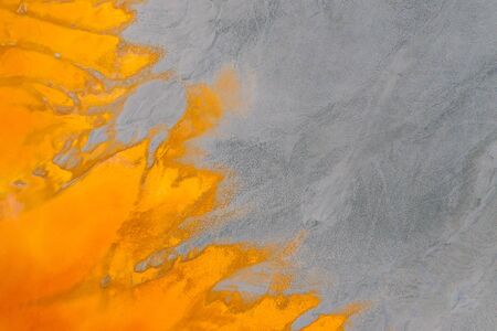 Drone view of contaminated, toxic water stream in Geamana, Romaniaの写真素材