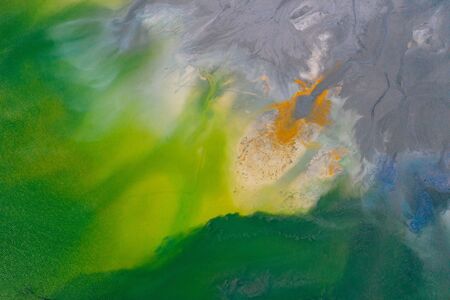 Drone view of contaminated, toxic water stream in Geamana, Romaniaの写真素材