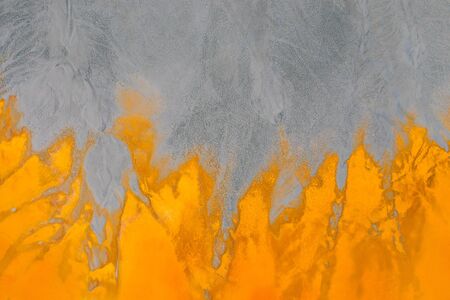 Drone view of contaminated, toxic water stream in Geamana, Romaniaの写真素材