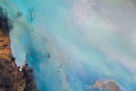 Drone view of contaminated, toxic water stream in Geamana, Romaniaの写真素材