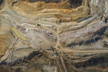 Aerial view of an open mine pit. Exploitation and nature pollutionの写真素材
