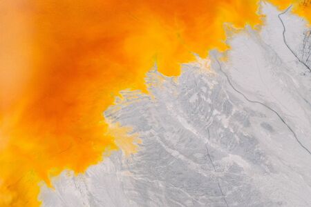 Drone view of contaminated, toxic water stream in Geamana, Romaniaの写真素材