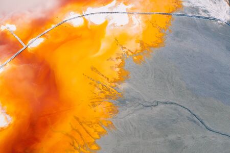 Drone view of contaminated, toxic water stream in Geamana, Romaniaの写真素材