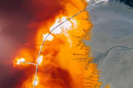 Drone view of contaminated, toxic water stream in Geamana, Romaniaの写真素材