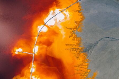 Drone view of contaminated, toxic water stream in Geamana, Romaniaの写真素材