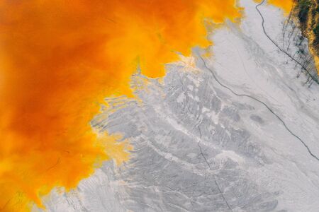 Drone view of contaminated, toxic water stream in Geamana, Romaniaの写真素材